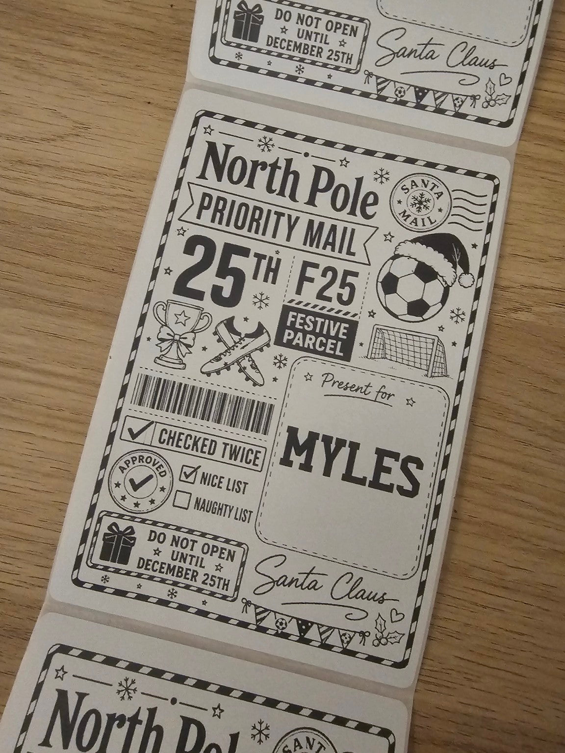 Personalised football themed Christmas parcel sticker labels with North Pole priority mail design